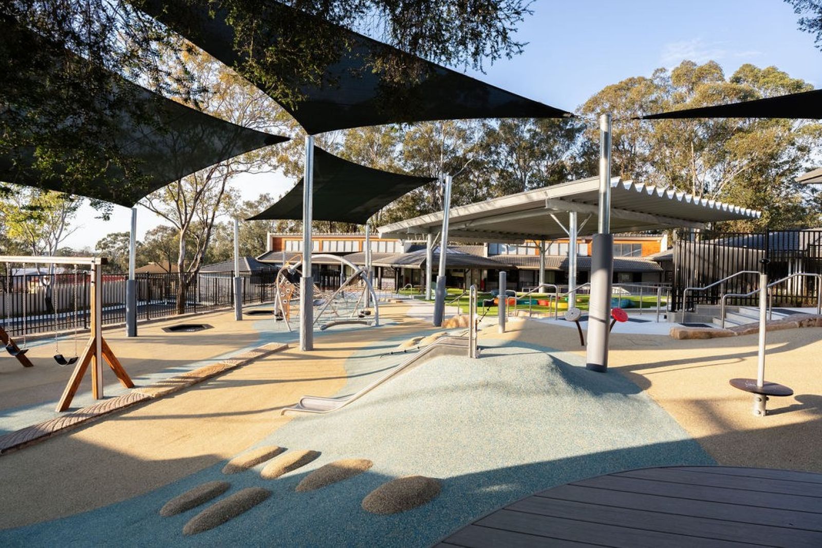 Accessible outdoor space with ramps, seating and shade structures